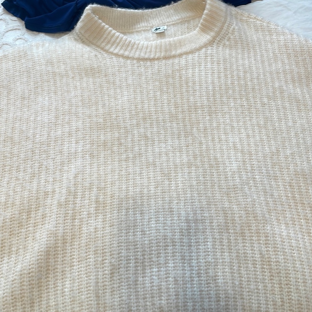 Sad to see this one go but it must! The softest sweater!